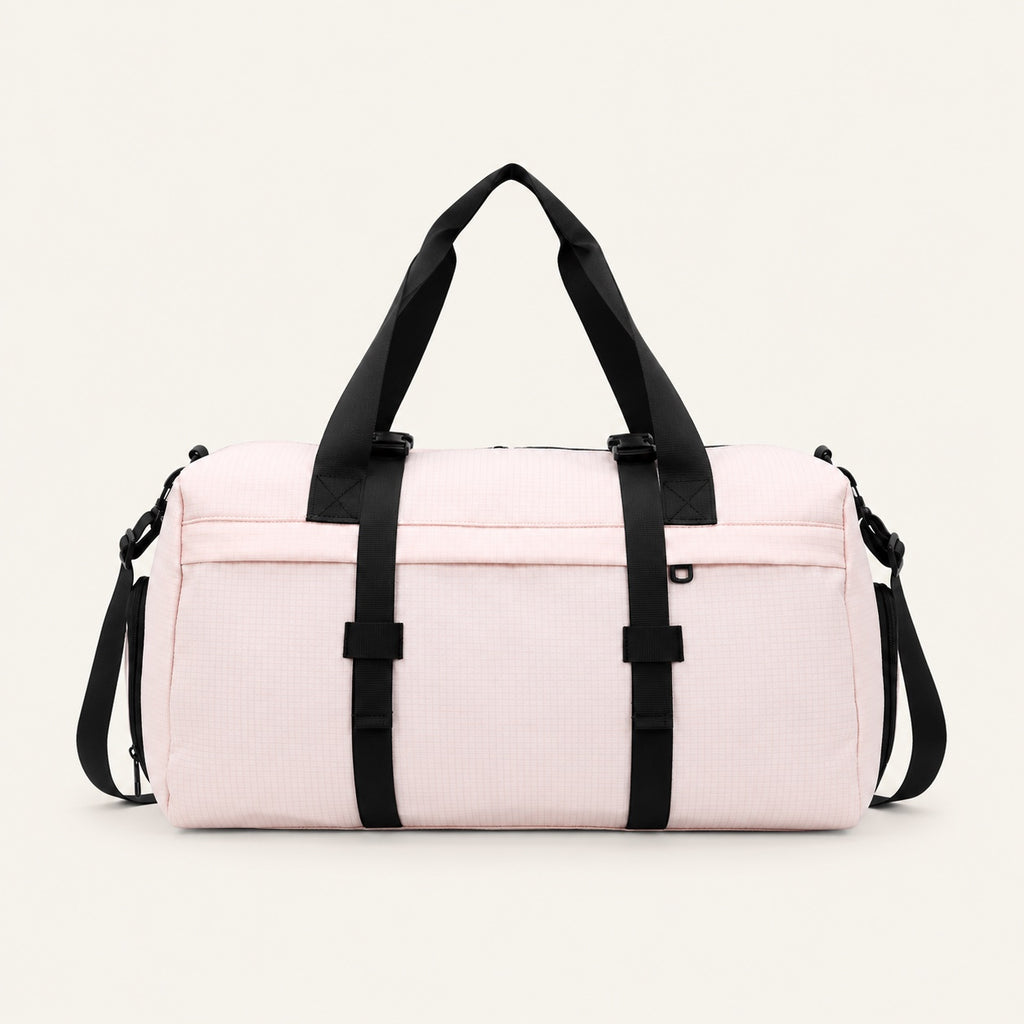 Sac de voyage rétro en toile — packshot sur fond ivoire